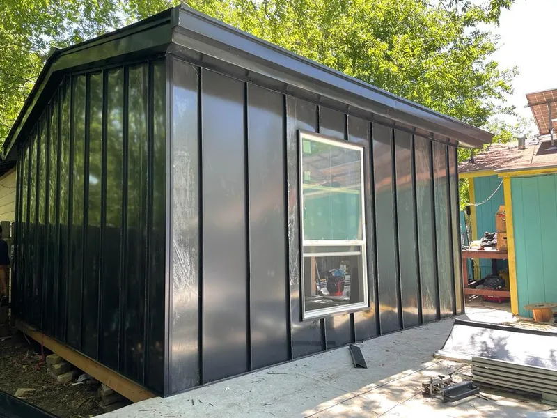 Black standing seam metal wall panels for Roof Inspection in Rockwood