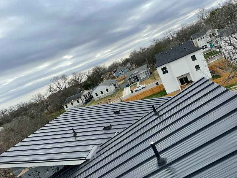 Standing seam metal roof panels with vents for Skylight Repair in Rockwood